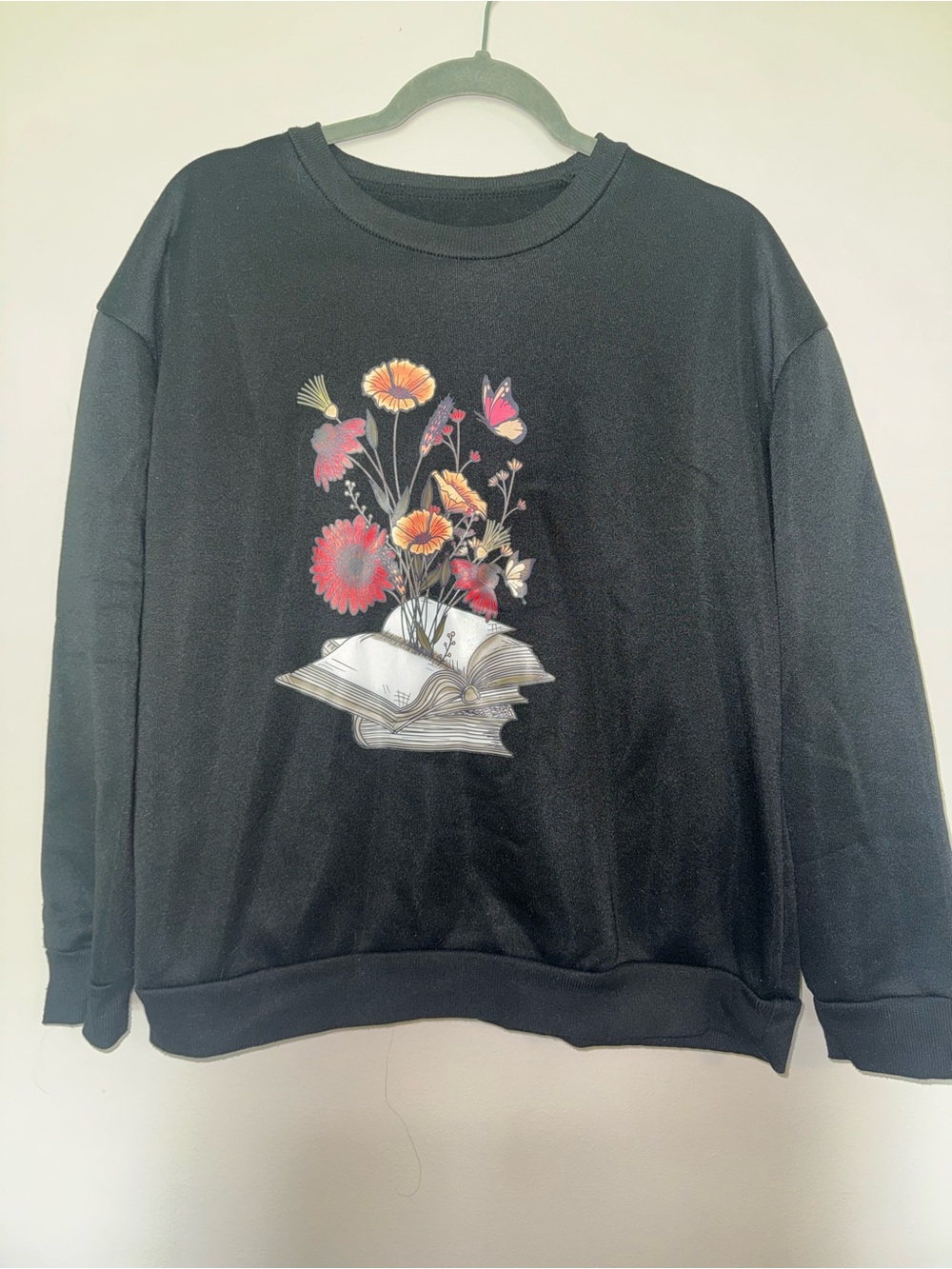 SHEIN Black Crewneck Sweatshirt with Floral Book Graphic